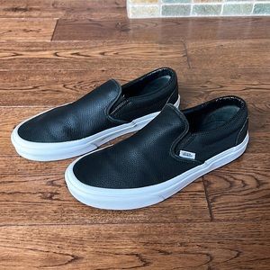 Black leather VANS.